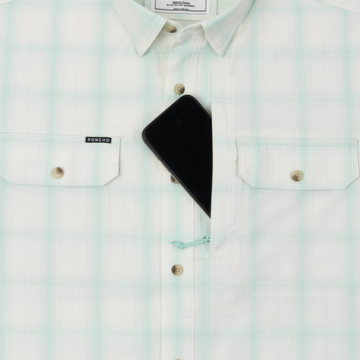 Phone in chest zipper pocket of shirt