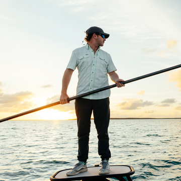 man on the water wearing the drowned cays shirt