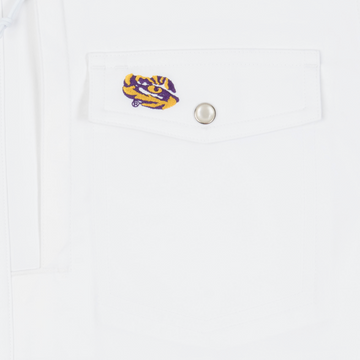 closeup of logo on pocket of shirt