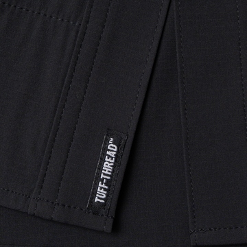 Photo of Tuff-Thread logo tag at bottom of shirt