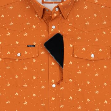 Phone in chest zipper pocket of shirt