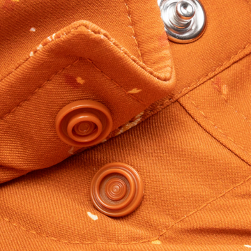 Closeup of collar snaps on collar of shirt
