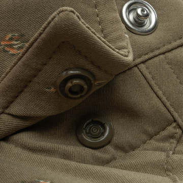 Closeup of collar snaps on collar of shirt