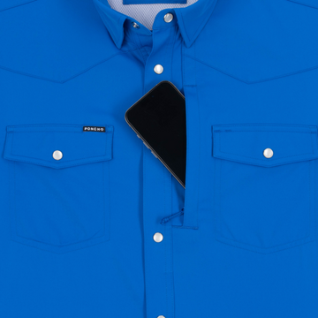 Phone in chest zipper pocket of shirt