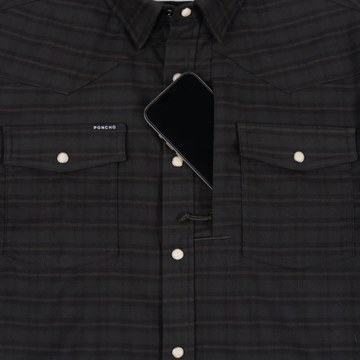 Phone in chest zipper pocket of shirt