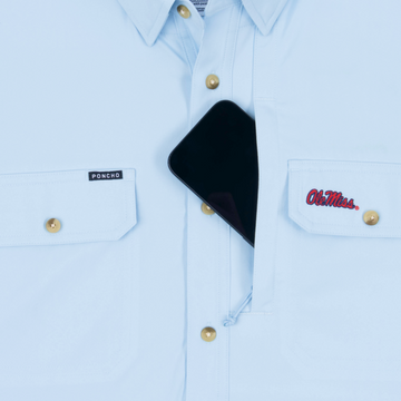 phone in chest zipper pocket of shirt