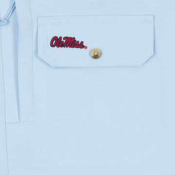 closeup of logo on pocket of shirt