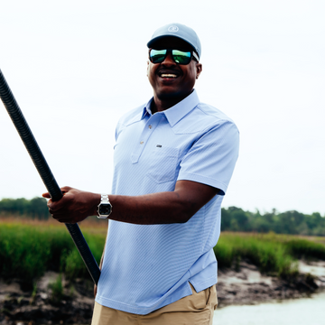 man wearing the haulover inlet holding pole