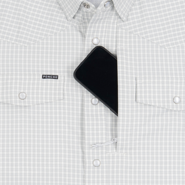 phone in chest zipper pocket of shirt