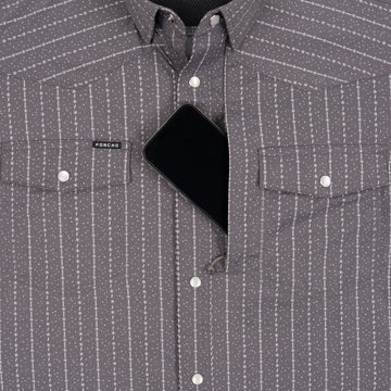 Phone in chest zipper pocket of shirt