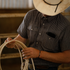 Cowboy holding a rope while wearing The Hondo
