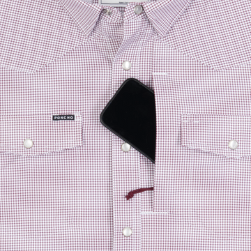 Phone in chest zipper pocket of shirt