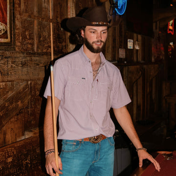 Man Holding Pool Cue