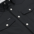 Close-up of black button-up shirt with pockets from The Jake collection