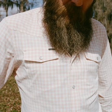 Close up of man wearing The Jambalaya shirt