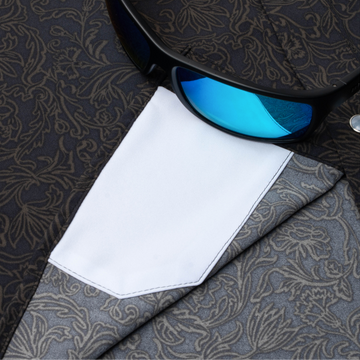 sunglasses with lens cleaner on shirt