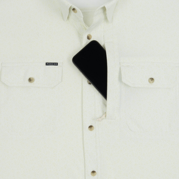 Phone in chest zipper pocket of shirt