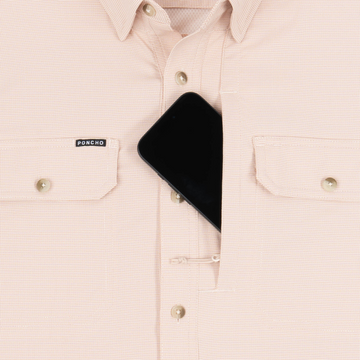 phone in chest zipper pocket of shirt