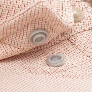 closeup of collar snaps on shirt
