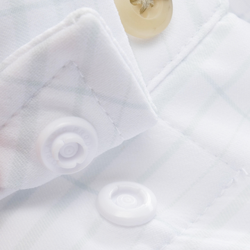 Closeup of collar snaps on collar of shirt