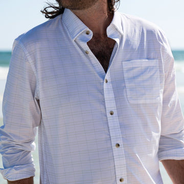 man wearing the live well shirt