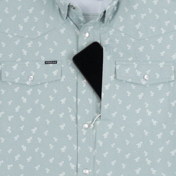 Phone in chest zipper pocket of shirt