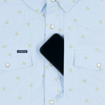 Phone in chest zipper pocket of shirt