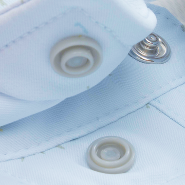 Closeup of collar snaps on collar of shirt