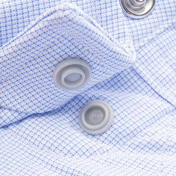 Closeup of collar snaps on collar of shirt
