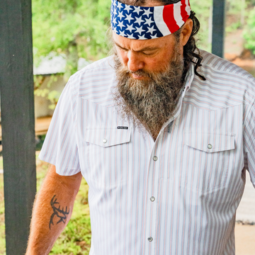 man wearing the old glory shirt