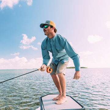 man fishing wearing the pennekamp shirt