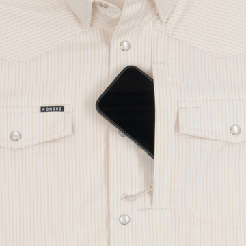 phone in chest zipper pocket of shirt