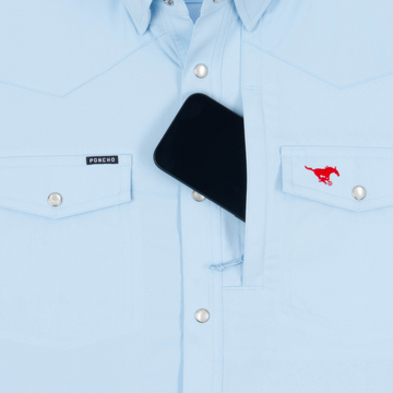 phone in chest zipper pocket of shirt