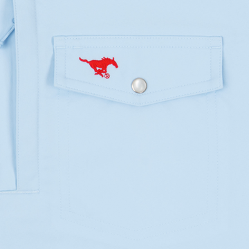 closeup of logo on pocket of shirt