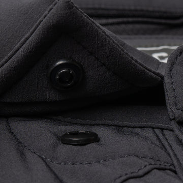 Closeup of collar snaps on collar of shirt
