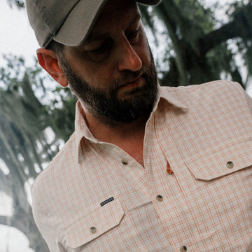 Man wearing The Roux shirt