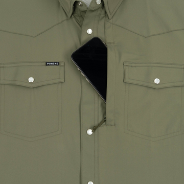 Phone in chest zipper pocket of shirt