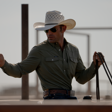 Cowboy wearing the Sabine while riding a horse