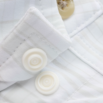 Closeup of collar snaps on collar of shirt