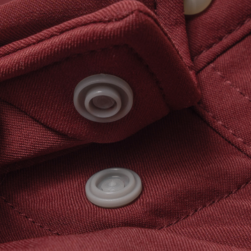Closeup of collar snaps on collar of shirt