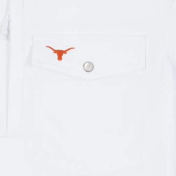 Logo on the pocket of the shirt