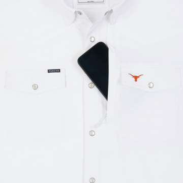 Phone in chest zipper pocket of shirt