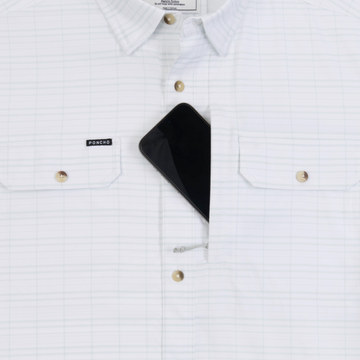 Phone in chest zipper pocket of shirt