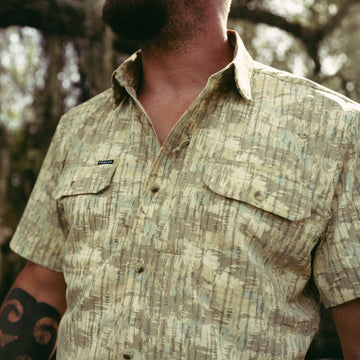 closeup of man wearing the swamp donkey shirt