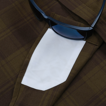 Close-up of The Telluride shirt pocket with sunglasses resting on top