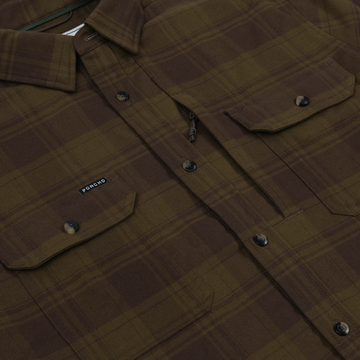 Close-up of The Telluride outdoors shirt in brown plaid fabric