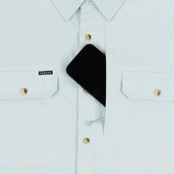 phone in chest zipper pocket of shirt
