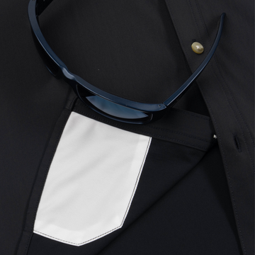 sunglasses with lens cleaner on shirt