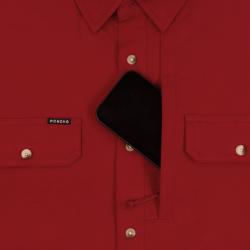 phone in chest zipper pocket of shirt