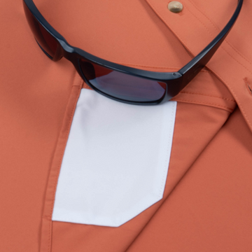 sunglasses with lens cleaner on shirt